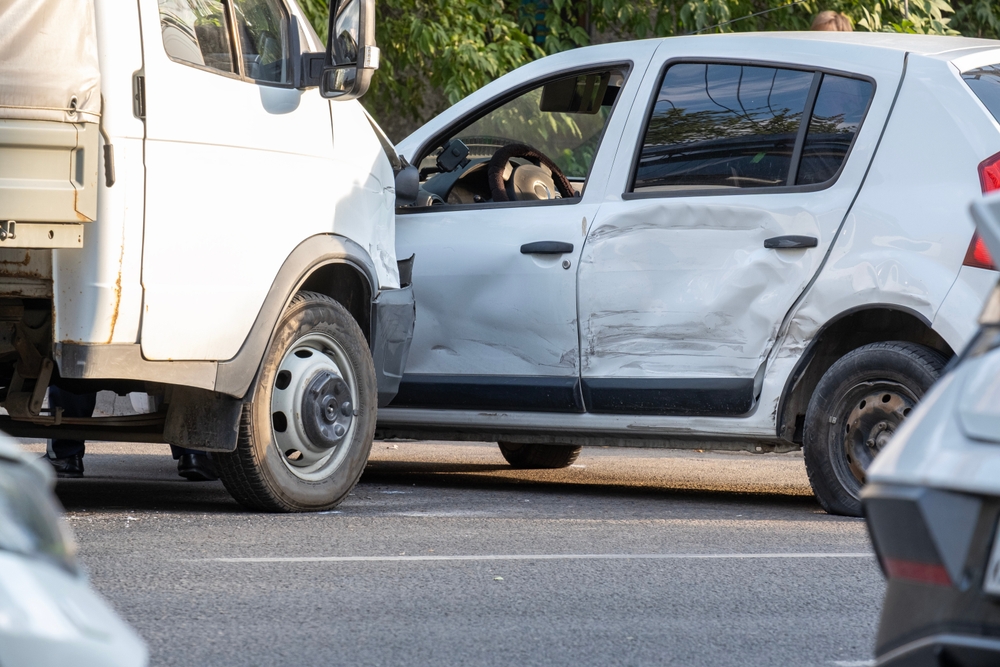 Side-impact collision between a commercial truck and a passenger vehicle in Kansas City